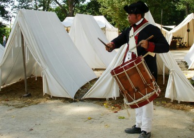 A Colonial Army soldier calls the troops to muster at Yorktown Victory Center (Scarborough photo)
