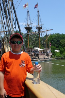 My son in Jamestown VA aboard the Godspeed, with the Susan Constant in the background (photo by Sheila Scarborough)
