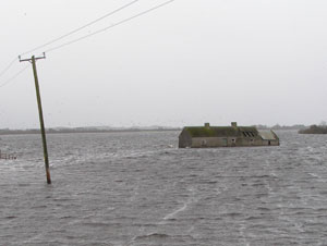 Shannon flood waters overwhelm a rural house