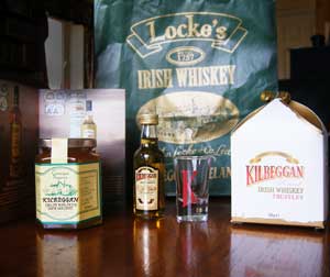 The swag - a goodie bag from Locke's distillery museum commemorating the starting of their whiskey distillation - shotglass, whiskey truffles, tiny Kilbeggan whiskey bottle, brochure and bag