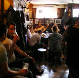 The crowd and session players in Sean's Bar at the Sunday session in Athlone
