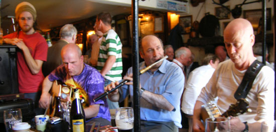 musicians play at the traditional session in sean's bar, athlone