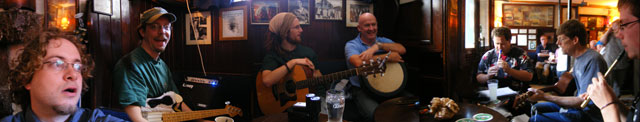 musicians (and arizonians) gathered round the table at the sunday session in sean's bar, athlone