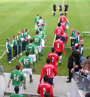 ireland versus chile in athlone town stadium - the players take to the pitch