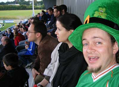 sean lightholder dressed in leprechaun hat and Irish soccer jersey in the stands at Athlone Town Stadium at the Ireland vs Chile match