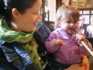 Wifey and the munchkin playing Irish whistle in Sean's Bar, Athlone at the sunday session